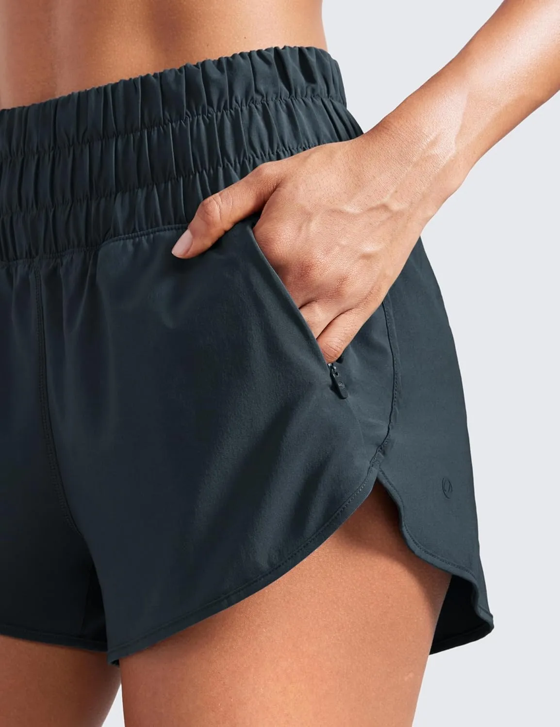 CRZ YOGA High Waisted Dolphin Running Shorts for Womens Mesh Liner for Gym Workout Athletic with Zipper Pocket